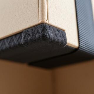 Foam edge protectors installed under straps