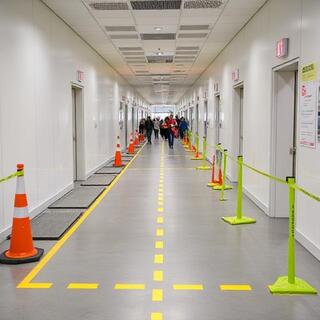 Buffer zone with labeled boxes ready for the lift