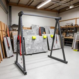 Stone slab secured on an A-frame with edge guards