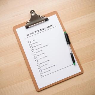 Crew chief marking items on a QA checklist