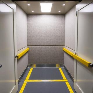 Padded service lift prepared for a move